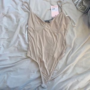 Nude slinky bodysuit